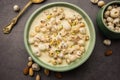 Sweet Roasted Makhana Kheer is an Indian dessert recipe, served in a bowl garnished with dry fruits