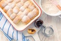 Sweet rolls, Buchteln filled with plum jam or jelly with backing ingredients