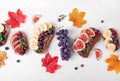 Sweet sandwiches assortment with chocolate nut butter and fruits Royalty Free Stock Photo