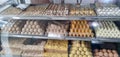 In India, bikaner sweets, shops, sweets, modak, pedhe, barfi, mawa barfi, glass, delicious sweets, people are very crowded to eat