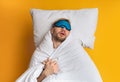 Sweet sleep in comfortable bed. Guy sleeps in mask Royalty Free Stock Photo