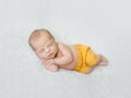 Sweet sleeping newborn boy in yellow panties Royalty Free Stock Photo