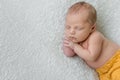 Sweet sleeping newborn boy in yellow panties Royalty Free Stock Photo