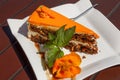 Sweet slice of carrot cake on a white plate Royalty Free Stock Photo