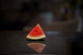 Sweet sliced watermelon piece against white background.