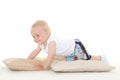 Sweet small baby with pillows. Royalty Free Stock Photo