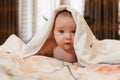 Sweet small baby with towel