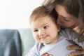 Sweet smiling baby boy laughing together with his mother. Royalty Free Stock Photo