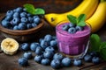 Sweet smoothie or milkshake with banana and blueberries. Purple colorful fruit juice milkshake. Diet smoothie with yogurt or milk Royalty Free Stock Photo