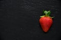 Portrait of a single and red strawberry Royalty Free Stock Photo