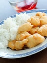 Sweet and sour chicken with dipping sauce.