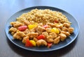 Sweet and sour chicken with egg fried rice. Royalty Free Stock Photo