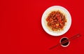 Sweet and Sour fried pork chunks with vegetables and rice. Top view with copy space Royalty Free Stock Photo