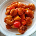 Sweet and Sour Pork with tomato and pine apple Royalty Free Stock Photo