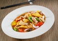 Sweet and sour sauce fried with seafood shrimp squid. Royalty Free Stock Photo