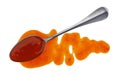 Sweet and sour sauce. Splashes and spilled orange sauce with spoon isolated on white background. Top view