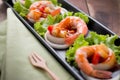 sweet and sour shrimp, prawn cocktail on long square dish and wooden background Royalty Free Stock Photo