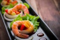 Sweet and sour shrimp, prawn cocktail on long square dish and wo Royalty Free Stock Photo