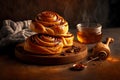 sweet spiral cinnamon buns with layer of caramel on table