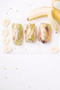 sweet spring rolls of fruit next to a fresh, banana Royalty Free Stock Photo