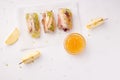 Sweet spring rolls of fruits on a white background Royalty Free Stock Photo