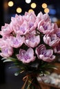 In a Sweet Still Life Scene, a Lovely Bouquet of Pink Flowers Rests in a Vase on the Table. Ai generative