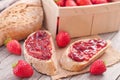 Sweet strawberries jam on bread slice. Royalty Free Stock Photo