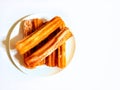 sweet sugared churros, traditional Argentine fried dough pastry,