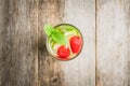 Sweet summer cocktail with raspberry and lime on the rustic background Royalty Free Stock Photo