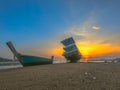 Sweet sunrise above fishing boats on the beach. Royalty Free Stock Photo