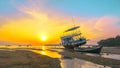 Sweet sunrise above fishing boats on the beach. Royalty Free Stock Photo