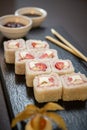 Sweet sushi rolls, strawberries, banana, chocolate Royalty Free Stock Photo