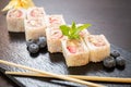 Sweet sushi rolls, strawberries, banana, chocolate Royalty Free Stock Photo