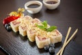 Sweet sushi rolls, strawberries, banana, chocolate Royalty Free Stock Photo