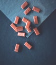 Sweet swiss chocolate candies on a stone tabletop, flatlay