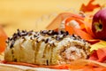 Sweet swiss roll roulette with caramel and cream