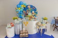 Sweet table and big cake for first birthday