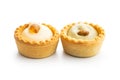 Sweet tarlets. Tasty mini tarts. Mini pie with cream isolated on white background