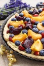 Sweet tart with peaches, plums and blueberries Royalty Free Stock Photo