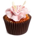 Sweet tasty homemade cupcake with strawberry cream isolated