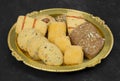 Sweet And Tasty Mixed Cookies or Biscuits Served in Golden Plate Royalty Free Stock Photo