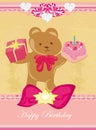 Sweet teddy bear holding a birthday cake