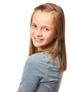 The sweet teenage years. Cropped studio portrait of a happy teenage girl looking over her shoulder. Royalty Free Stock Photo