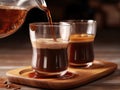 Sweet Temptations: Pouring Delicious Syrup into a Glass with Rich Coffee on a Wooden Table