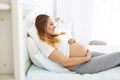 Joyful pregnant woman enjoying pregnancy Royalty Free Stock Photo