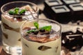 Sweet tiramisu with cacao powder in glass