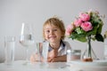 Sweet toddler boy, drinking water at home Royalty Free Stock Photo