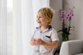 Sweet toddler boy, drinking water at home Royalty Free Stock Photo