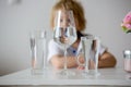 Sweet toddler boy, drinking water at home Royalty Free Stock Photo