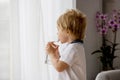 Sweet toddler boy, drinking water at home Royalty Free Stock Photo